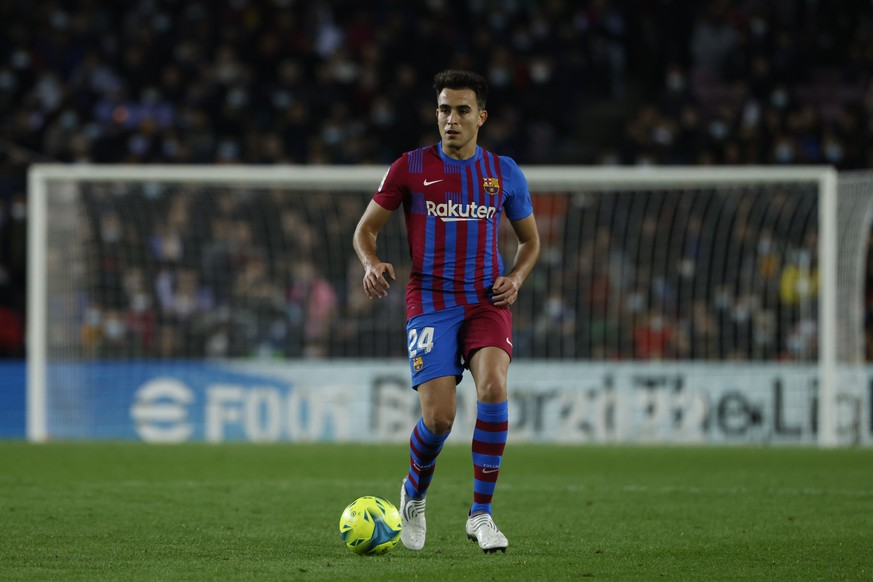 Barcelona's Eric Garcia runs with the ball during a Spanish La Liga soccer match between FC Barcelona and RCD Espanyol at the Camp Nou stadium in Barcelona, Spain, Saturday, Nov. 20, 2021. (AP Ph ...