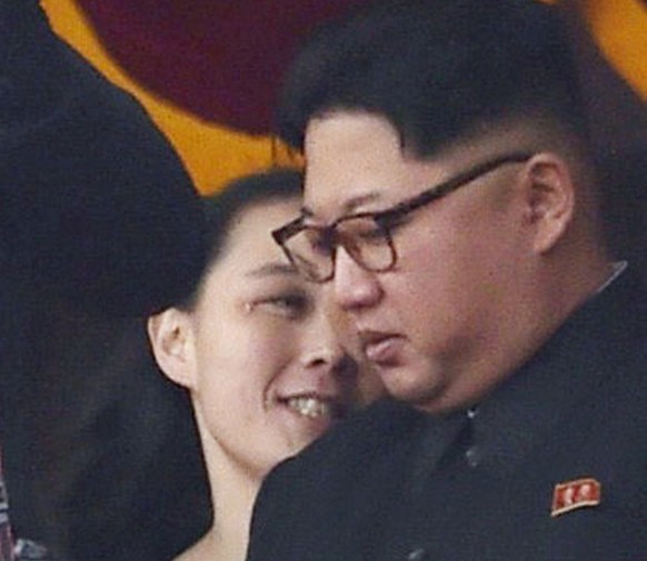 FILE - In this May 10, 2016, file photo, North Korean leader Kim Jong Un, right, and his sister Kim Yo Jong watch a military parade at Kim Il Sung Square in Pyongyang, North Korea. South Korea’s Unifi ...