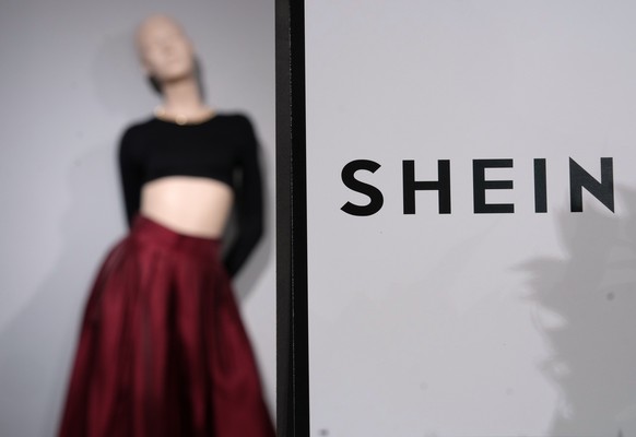 FILE - Clothes by Chinese company Shein are seen in the BHV (Bazar de l'Hotel de Ville) department store, Tuesday, Nov. 4, 2025 in Paris. (AP Photo/Aurelien Morissard, File)
France Shein
