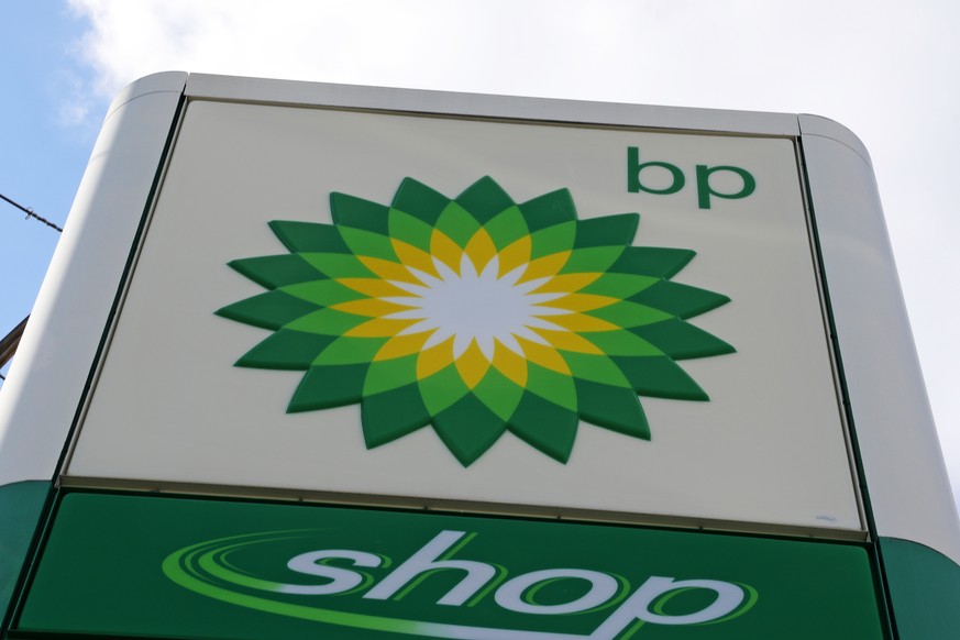 FILE - In this Friday, March 17, 2017 file photo, the sign at a BP gas station in downtown Pittsburgh. The board of energy giant BP says it will support a resolution from a group of institutional inve ...