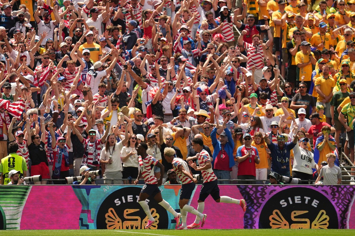 US players celebrate the opening goal of their team during the World Cup Group D soccer match between the United States and Australia in Seattle, Friday, June 19, 2026. (AP Photo/Abbie Parr)
Mathew Le ...