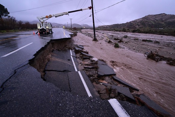 Part of California State Route 138 washes away from flooding Wednesday, Dec. 24, 2025, outside of Wrightwood, Calif. (AP Photo/Wally Skalij)
APTOPIX Extreme Weather California