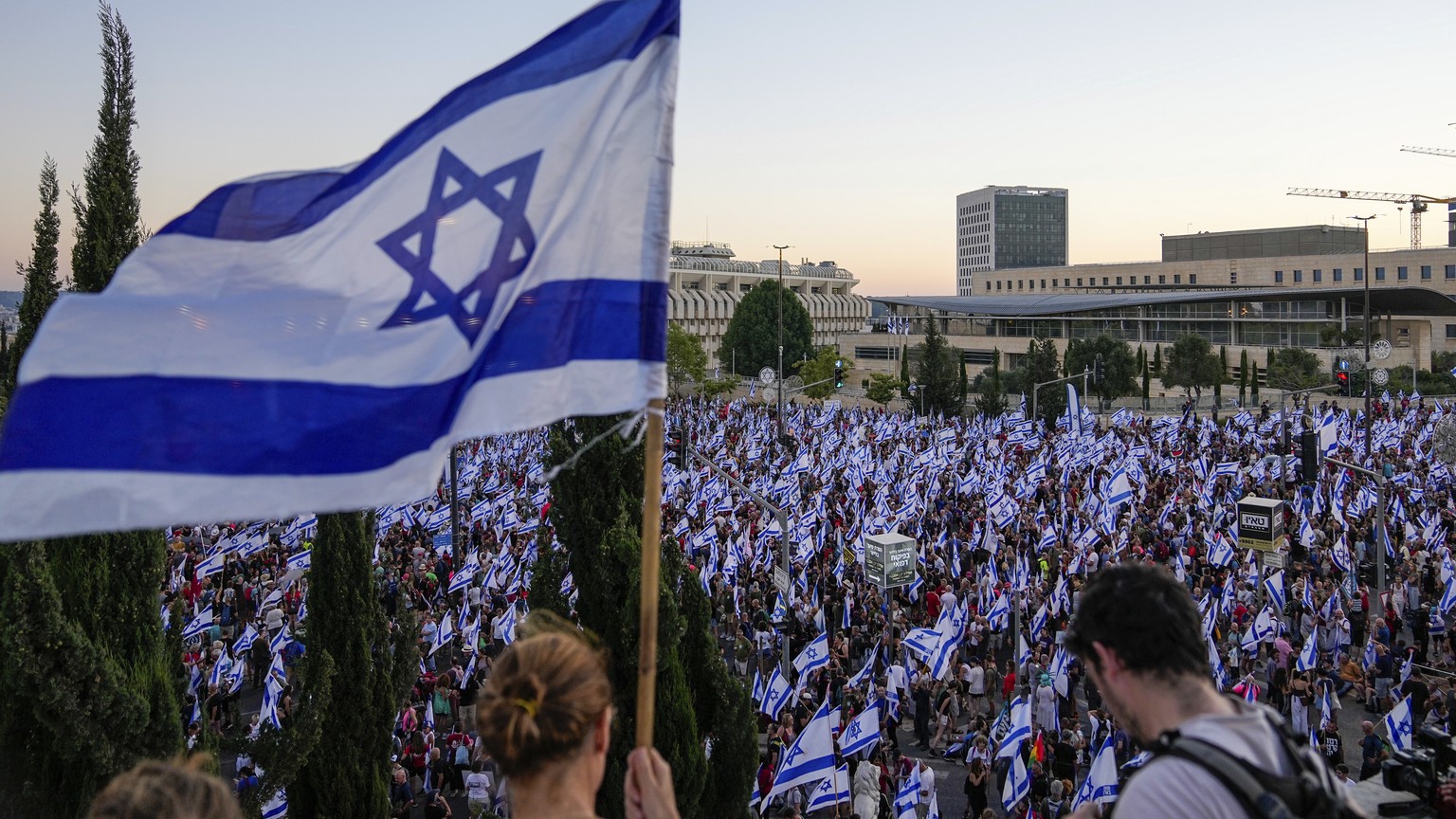 Thousands of Israelis protest against plans by Prime Minister Benjamin Netanyahu&#039;s government to overhaul the judicial system, in Jerusalem, Saturday, July 22, 2023. Thousands of demonstrators en ...