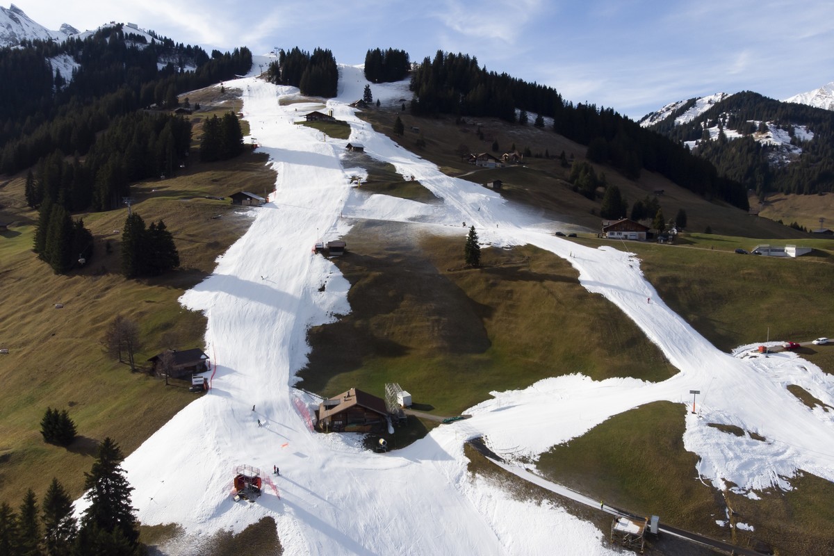 The race slope of the Alpine Skiing FIS Ski World Cup, left, covered with artificial snow pictured, at Adelboden, Switzerland, Wednesday, December 28, 2022.The alpine skiing World Cup men's races ...