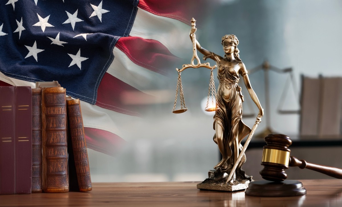 Legal and law concept. Statue of Lady Justice with scales of justice and wooden judge gavel on wooden table. Panoramic image statue of lady justice.
