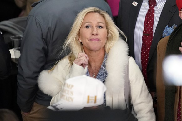 Rep. Marjorie Taylor Greene, R-Ga., arrives before Republican presidential candidate former President Donald Trump speaks at a caucus night party in Des Moines, Iowa, Monday, Jan. 15, 2024.(AP Photo/P ...