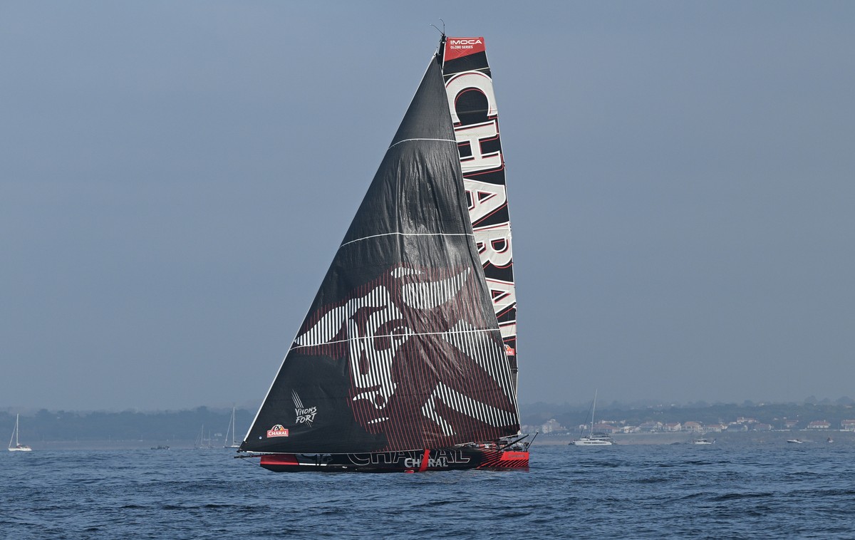 epa11713301 The IMOCA yacht 'Charal' of French skipper Jeremie Beyou, takes the start of the Vendee Globe 2024 single-handed non-stop around the world sailing race, off the coast of Sables d ...