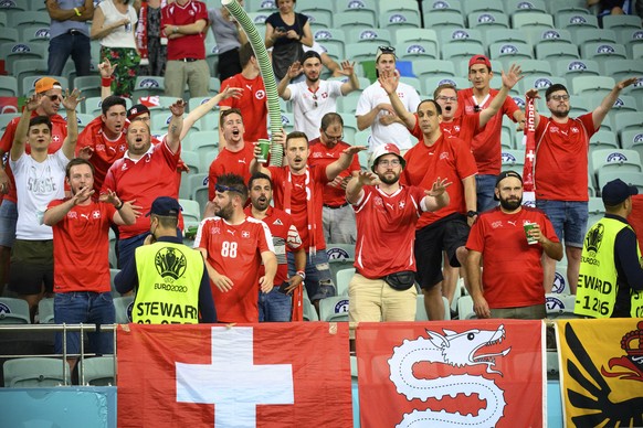 Switzerland&#039;s supporters celebrates the victory after the Euro 2020 soccer tournament group A match between Switzerland and Turkey at the Olympic stadium, in Baku, Azerbaijan, Sunday, June 20, 20 ...