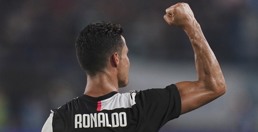 In this photo released by Xinhua News Agency, Cristiano Ronaldo of Juventus celebrates after scoring in the International Champions Cup football friendly match between Juventus and Inter Milan in Nanj ...