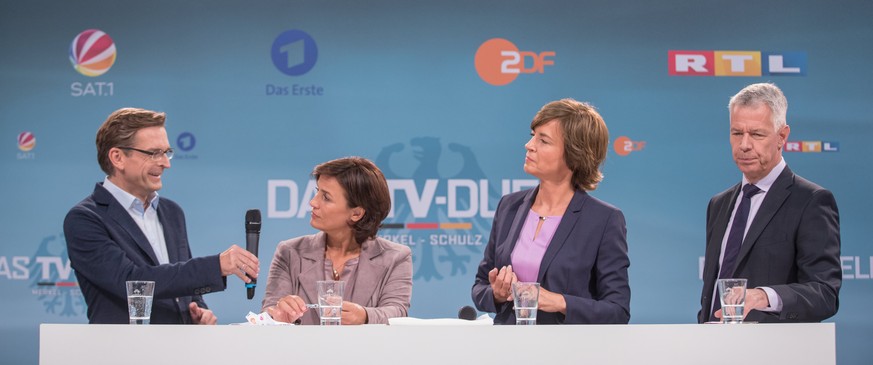 epa06176508 German TV journalists Claus Strunz (L-R), Sandra Maischberger, Maybrit Illner and Peter Kloeppel during a press conference on the upcoming TV duel of German Chancellor Angela Merkel and Ch ...