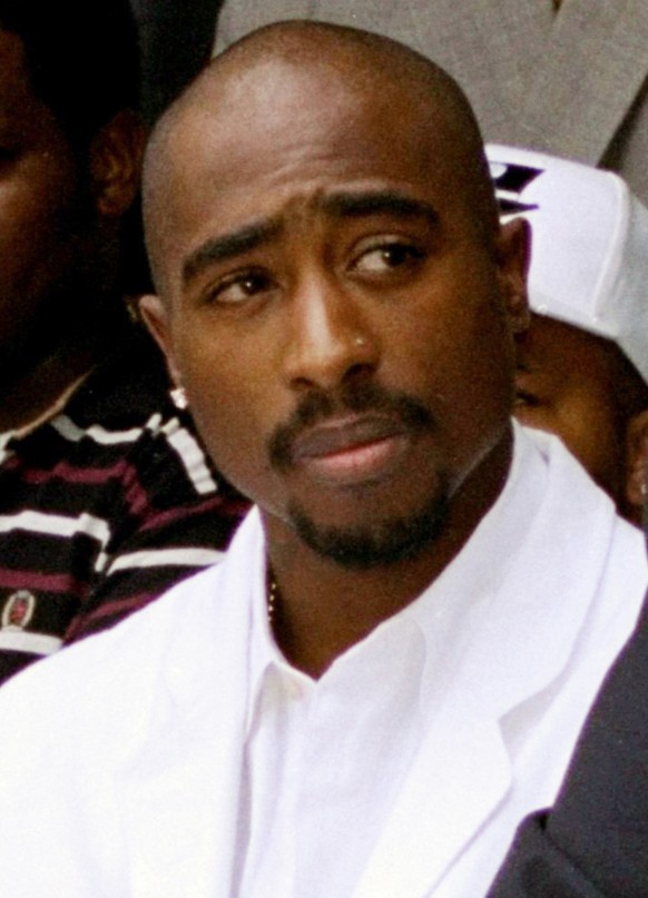 FILE - Rapper Tupac Shakur attends a voter registration event in South Central Los Angeles, Aug. 15, 1996. Authorities in Nevada confirmed Tuesday, July 18, 2023, that they served a search warrant thi ...