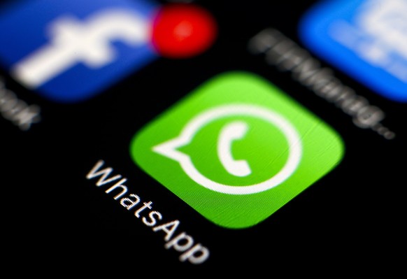 epa09442518 (FILE) - The logo of the messaging application WhatsApp on a smartphone in Taipei, Taiwan, 07 April 2016 (reissued 02 September 2021). The Irish Data Protection Commissioner (DPC) in a sta ...