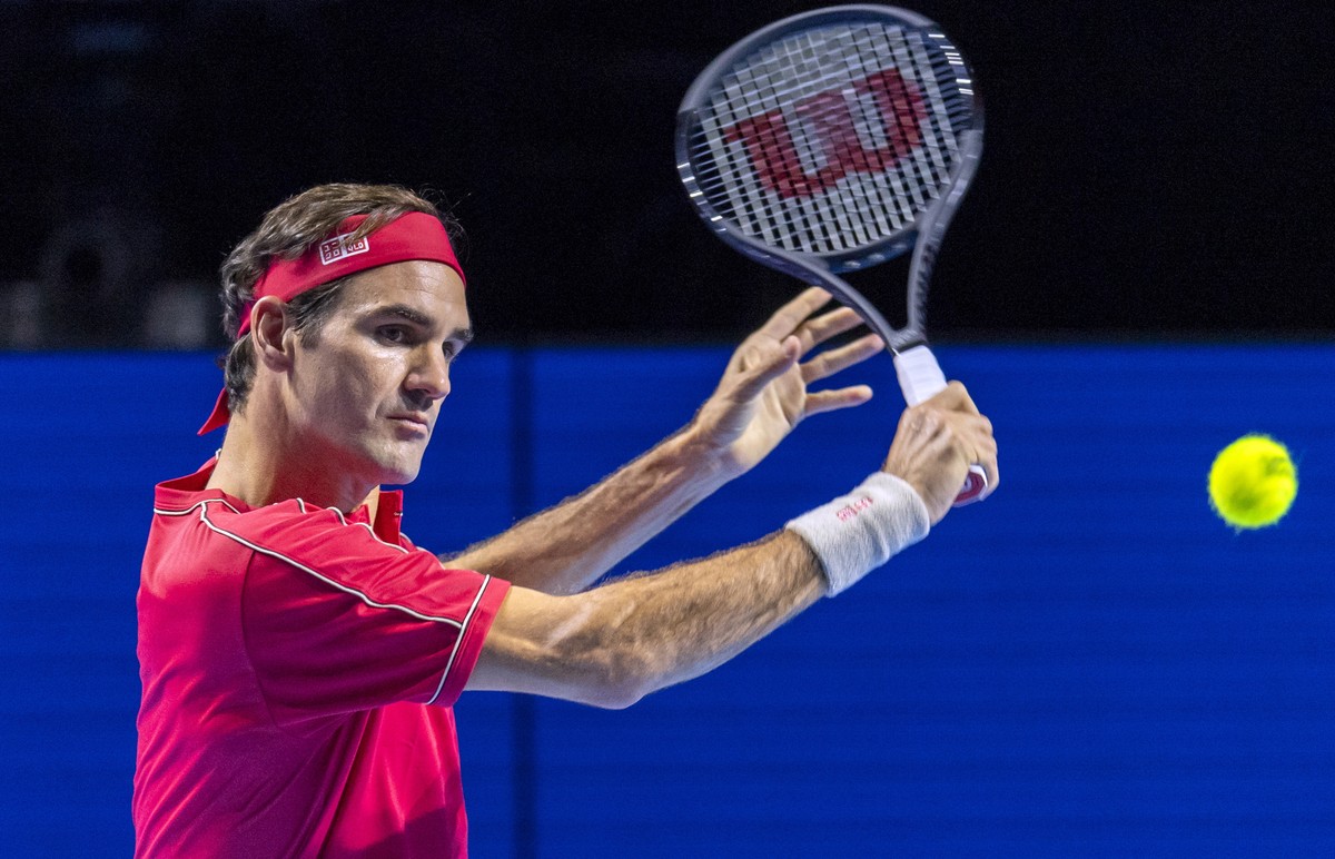 epa07939124 Switzerland's Roger Federer in action during his first round match against Germany's Peter Gojowczyk at the Swiss Indoors tennis tournament in Basel, Switzerland, 21 October 2019 ...