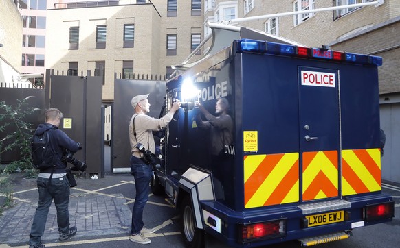 An armored police vehicle, believed to contain Salih Khater, drives into the car park at Westminster Magistrates court in London, Monday, Aug. 20, 2018. The Metropolitan Police force said 29-year-old  ...