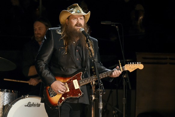 FILE - Chris Stapleton performs at the 50th annual CMA Awards in Nashville, Tenn., on Nov. 2, 2016. Stapleton will hit next month?s Super Bowl stage to sing the national anthem, while R&amp;B legend B ...