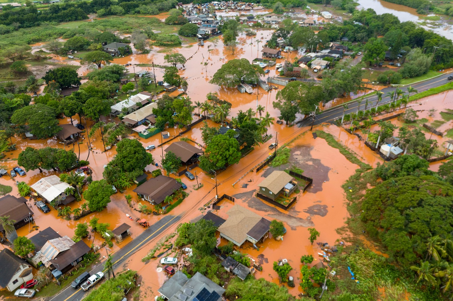 Fooding covers a residential neighborhood in Waialua, Hawaii, Friday, March 20, 2026. (AP Photo/Mengshin Lin)
Hawaii Floods