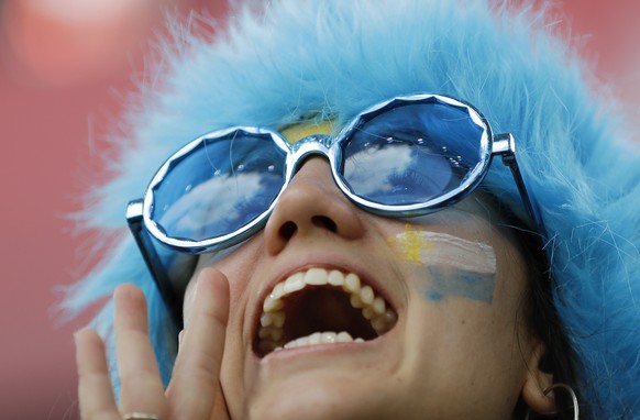 Uruguayan fan gets ready to cheer on her side before the start of the group A match between Egypt and Uruguay at the 2018 soccer World Cup in the Yekaterinburg Arena in Yekaterinburg, Russia, Friday,  ...