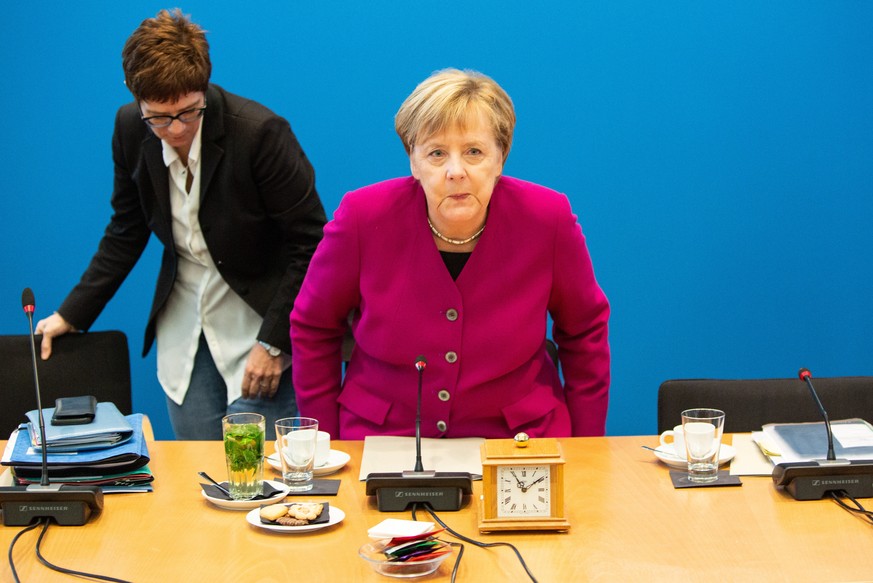 epa07128862 (L-R) CDU Secretary General Annegret Kramp-Karrenbauer and German Chancellor Angela Merkel arrive for a Federal Board Meeting of the Christian Democratic Union (CDU) at the CDU&#039;s head ...