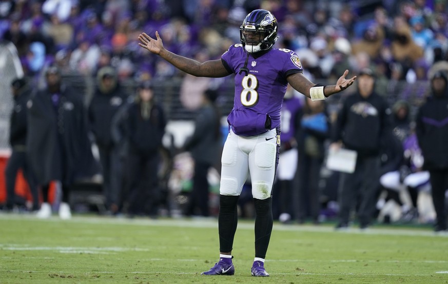 Baltimore Ravens quarterback Lamar Jackson (8) reacts to a call in the second half of an NFL football game against the Carolina Panthers Sunday, Nov. 20, 2022, in Baltimore. (AP Photo/Patrick Semansky ...