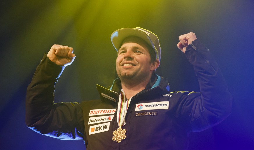 Gold medalist Beat Feuz of Switzerland reacts during the men downhill winner presentation at the 2017 FIS Alpine Skiing World Championships in St. Moritz, Switzerland, Sunday, February 12, 2017. (KEYS ...