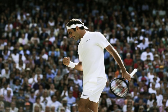 epa06088062 Roger Federer of Switzerland reacts against Tomas Berdych of Czech Republic during his semi final match of the Wimbledon Championships at the All England Lawn Tennis Club, in London, Brita ...