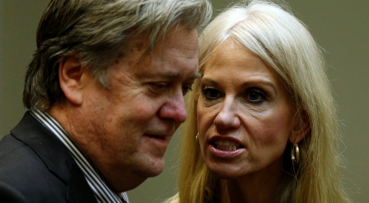 U.S. President Donald Trump's chief strategist Steve Bannon (L) and senior aide Kellyanne Conway speak at meeting hosted by Trump with cyber security experts in the Roosevelt Room of the White Ho ...