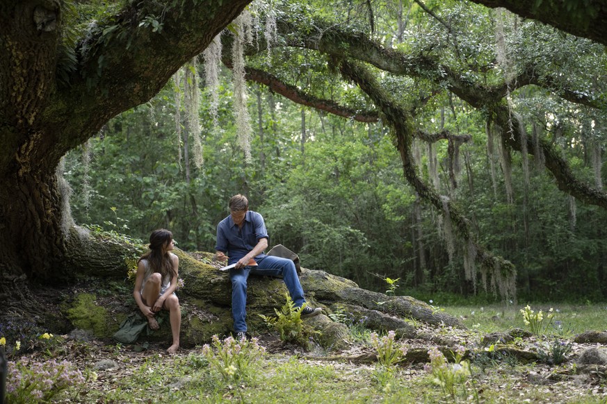 This image released by Columbia Pictures shows Daisy Edgar-Jones, left, and Taylor John Smith in a scene from &quot;Where the Crawdads Sing.&quot; (Michele K. Short/Sony Pictures via AP)