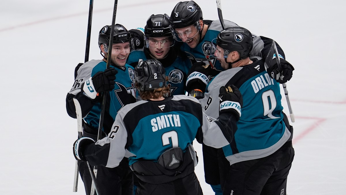 San Jose Sharks center Philipp Kurashev, left, celebrates with teammates after scoring a goal during the second period of an NHL hockey game against the Los Angeles Kings, Thursday, Nov. 20, 2025, in  ...