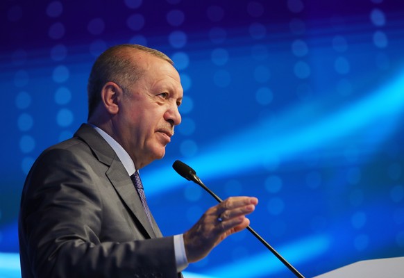 epa09303398 A handout photo made available by the Turkish President Press office shows Turkish President Recep Tayyip Erdogan speaking during the Istanbul Canal Bridge groundbreaking ceremony in Istan ...