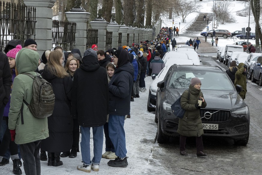 epa11225579 Russians living in Finland gather to vote at the Russian embassy in Helsinki, Finland, 17 March 2024. Opponents of Putin were called to vote on 17 March at 12:00 noon, on the last day of v ...