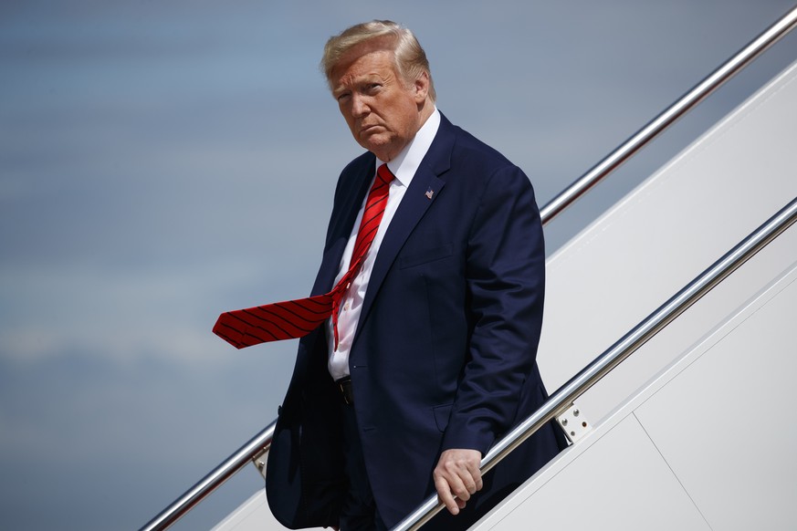 President Donald Trump steps off Air Force One after arriving at Andrews Air Force Base, Thursday, Sept. 26, 2019, in Andrews Air Force Base, Md. (AP Photo/Evan Vucci)
Donald Trump