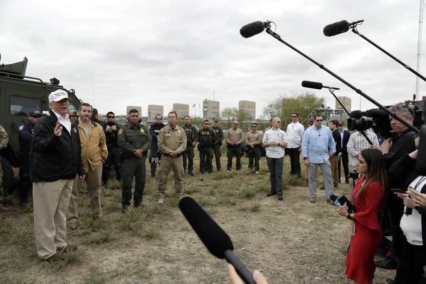 President Donald Trump speaks to the media as he tours the U.S. border with Mexico at the Rio Grande on the southern border, Thursday, Jan. 10, 2019, in McAllen, Texas. (AP Photo/ Evan Vucci)