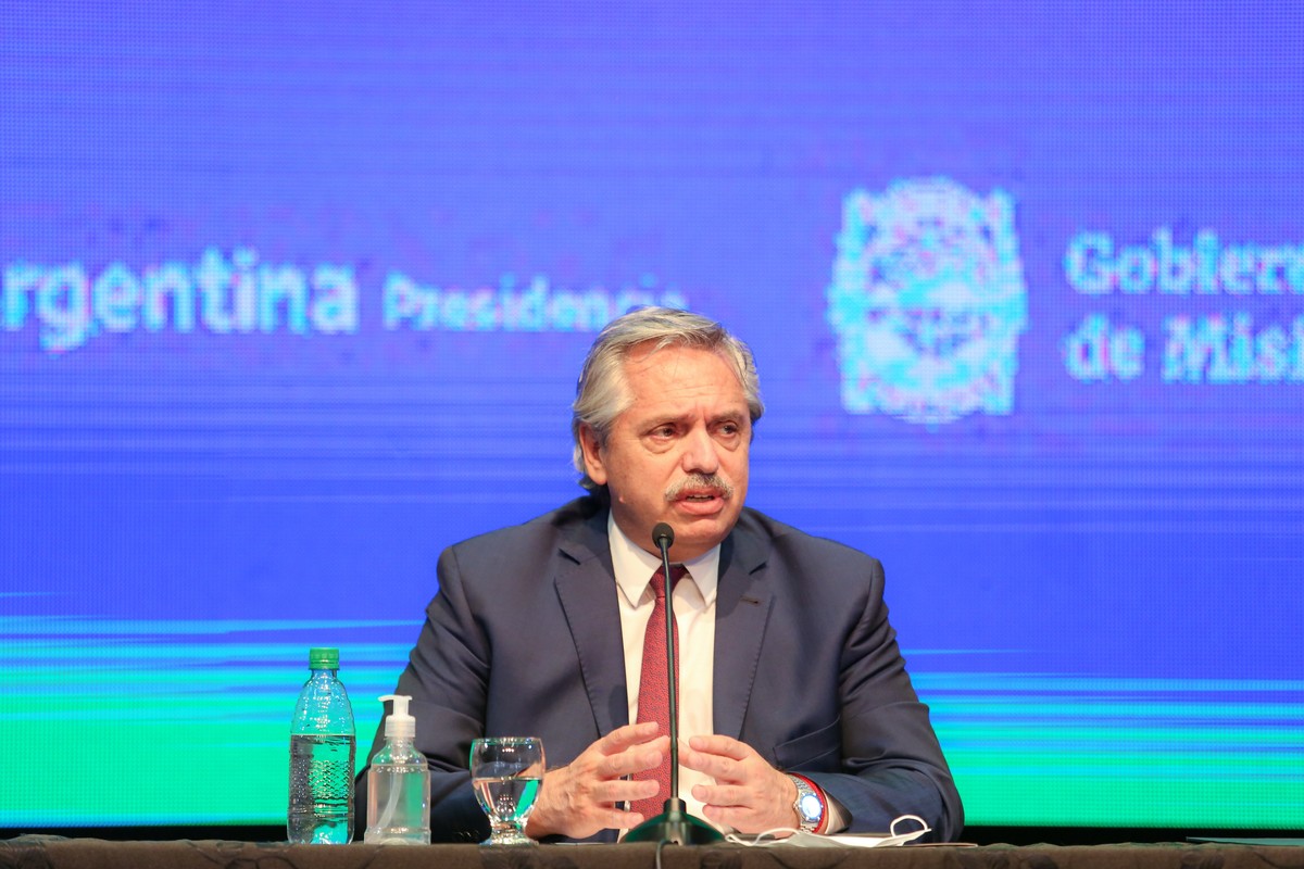 epa08769227 A handout photograph made available by Argentina's Presidential Office shows Argentine president Alberto Fernandez speaking at a press conference in Misiones, Argentina, 23 October 20 ...