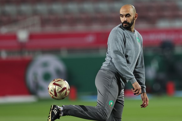 epa10368854 Head coach of Morocco Walid Regragui in action during a training session in Doha, Qatar, 16 December 2022. Morocco will face Croatia in their FIFA World Cup 2022 third place soccer match o ...