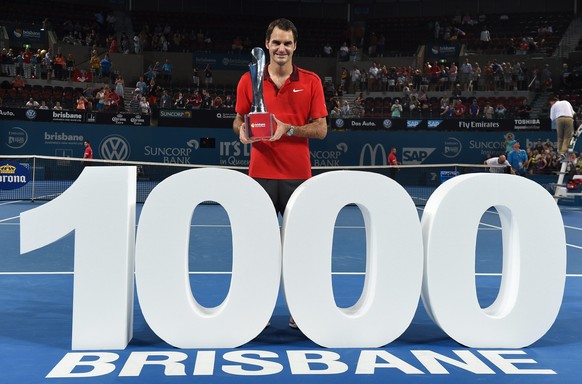 epa04554752 Roger Federer of Switzerland celebrates after winning the Mens final against Milos Raonic of Canada at the Brisbane International Tennis Tournament in Brisbane, Australia, Sunday, January  ...