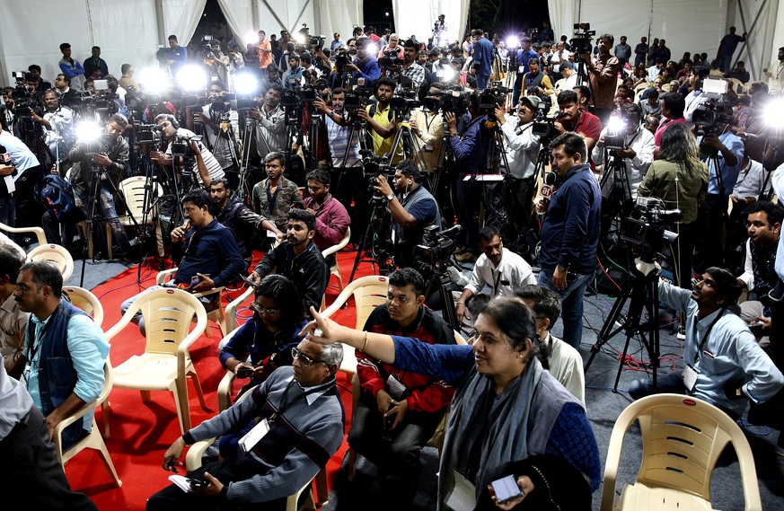 epa07824170 Journalists wait for the final announcement from the ISRO Official after the communication and data were lost from the vikram lander at ground station Indian Space Research Organization (I ...