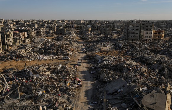 epa11840338 Destroyed buildings seen amid a ceasefire between Israel and Hamas, in Rafah, southern Gaza Strip, 20 January 2025. Israel and Hamas implemented the first phase of a hostage release and ce ...