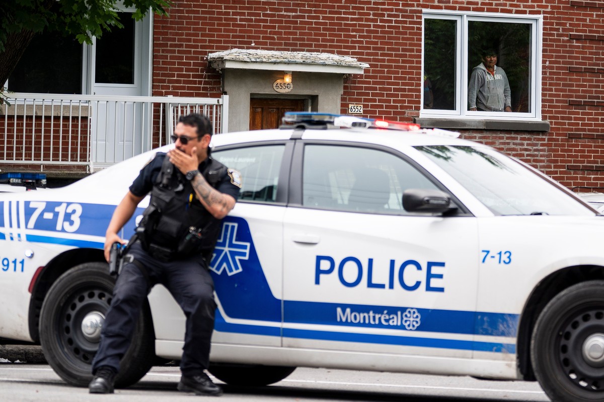 A residents looks on as Montreal police work the scene of a shooting in Montreal, Monday, June 22, 2026. (Christopher Katsarov/The Canadian Press via AP)
Canada Police Shots