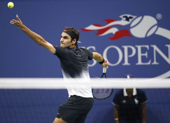 Roger Federer, of Switzerland, serves in the third set of a quarterfinal match against Juan Martin del Potro, of Argentina, at the U.S. Open tennis tournament in New York, Wednesday, Sept. 6, 2017. (A ...