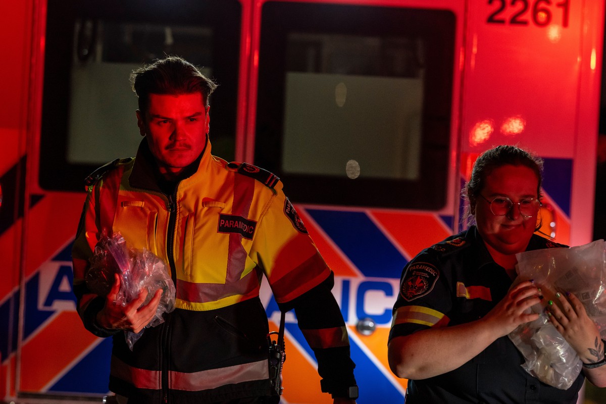 Paramedics work at the Wainwright Health Centre as injured military members are treated after a fire at Canadian Forces Base Wainwright, outside of Wainwright, Alberta Saturday, Oct. 17, 2026. (John U ...