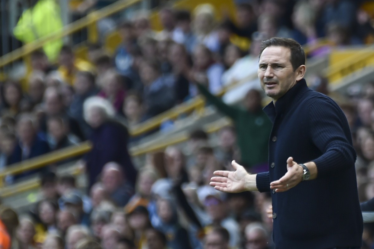 Chelsea's caretaker manager Frank Lampard reacts during the English Premier League soccer match between Wolverhampton Wanderers and Chelsea, at the Molineux Stadium, in Wolverhampton, England, Sa ...