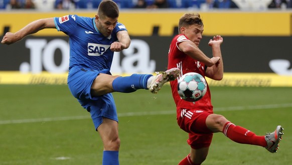 epa08701753 Hoffenheim&#039;s Andrej Kramaric (L) scores the 3-1 lead during the German Bundesliga soccer match between TSG 1899 Hoffenheim and FC Bayern Munich in Sinsheim, Germany, 27 September 2020 ...