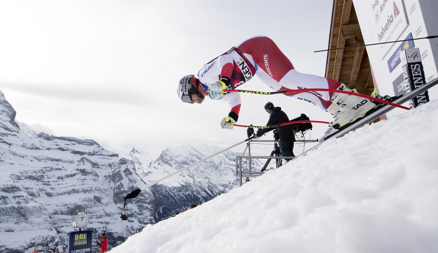 Beat Feuz of Switzerland starts his race during a training session for the men&#039;s downhill race at the Alpine skiing World Cup in Wengen, Switzerland, Wednesday, Jan. 10, 2018. (Anthony Anex/Keyst ...