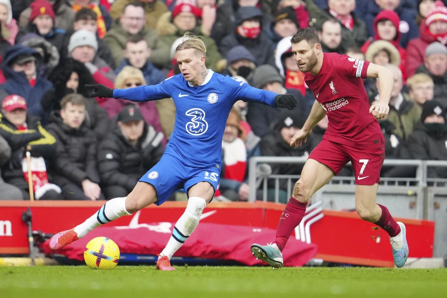 Chelsea&#039;s Mykhailo Mudryk controls the ball next to Liverpool&#039;s James Milner during the English Premier League soccer match between Liverpool and Chelsea at Anfield stadium in Liverpool, Eng ...