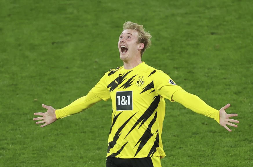 Dortmund&#039;s Julian Brandt celebrates scoring his team&#039;s first goal, during the German Bundesliga soccer match between Dortmund and Berlin Hertha, in Dortmund, Germany, Saturday, March 13, 202 ...