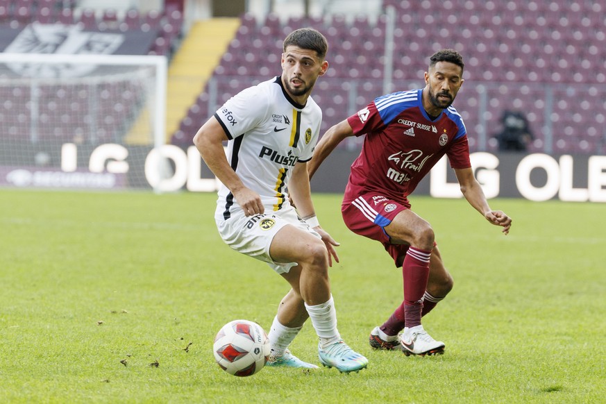 Young Boys&#039; midfielder Kastriot Imeri, left, controles the ball past Servette&#039;s defender Gael Clichy, right, during the Super League soccer match of Swiss Championship between Servette FC an ...