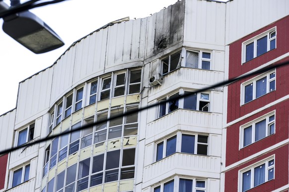 This photo shows a part of an apartment building which was reportedly damaged by Ukrainian drone in Moscow, Russia, Tuesday, May 30, 2023. In Moscow, residents reported hearing explosions and Mayor Se ...