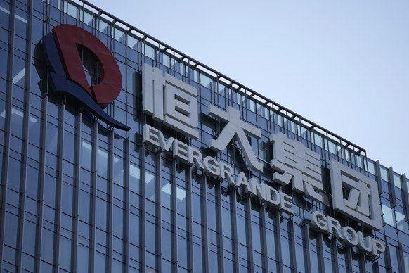 FILE - The Evergrande Group headquarters logo is seen in Shenzhen in southern China&#039;s Guangdong province, on Sept. 24, 2021. Share trading of debt-laden Chinese property developer China Evergrand ...