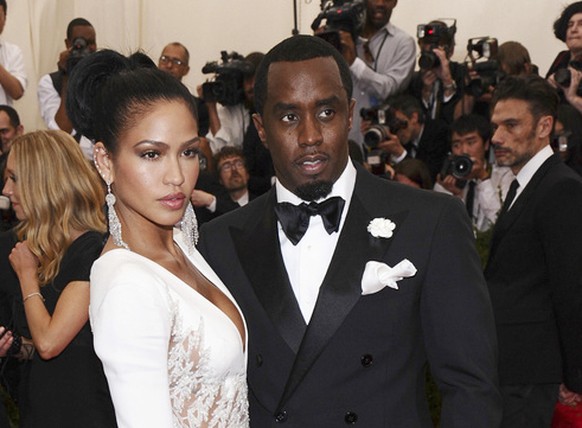 FILE - Cassie Ventura, left, and Sean &quot;Diddy&quot; Combs appear at The Metropolitan Museum of Art&#039;s Costume Institute benefit gala celebrating &quot;China: Through the Looking Glass&quot; in ...