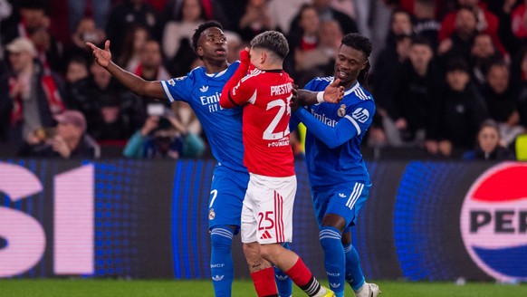 February 17, 2026, Lisbon, Lisboa, Portugal: Gianluca Prestianni of SL Benfica seems with Vinicius Junior of Real Madrid CF during the UEFA Champions League 2025/26 League Knockout Play-off First Leg  ...